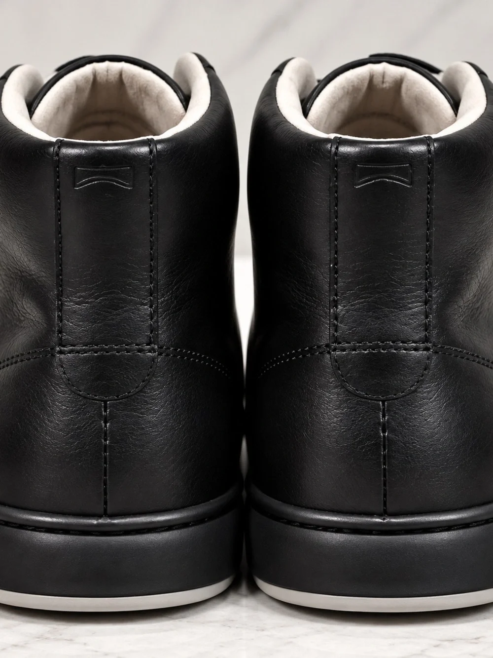 Camper Chasis men’s high-top sneakers / ankle boots in classic black leather.